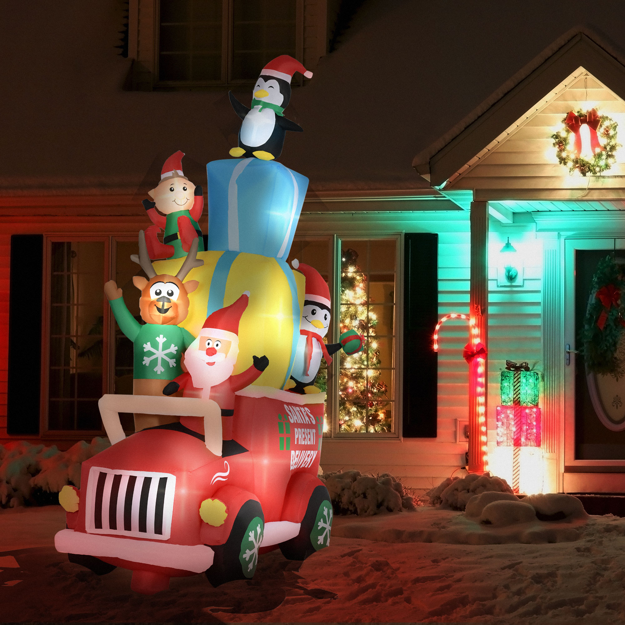 Inflable navideño de 9 pies: Santa Claus en auto con alce, elfo y pingüinos, con LED