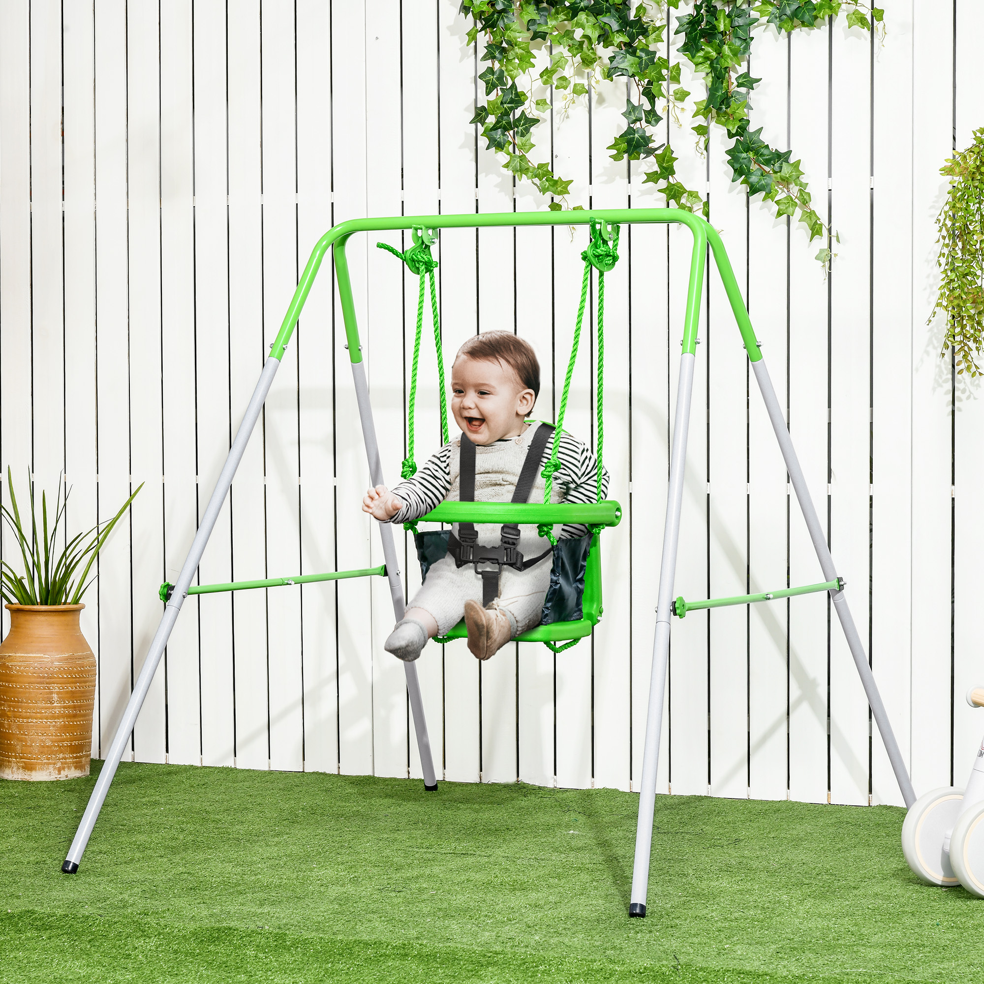 Columpio para niños pequeños con soporte de metal y cinturón de seguridad, 6-36 meses, verde