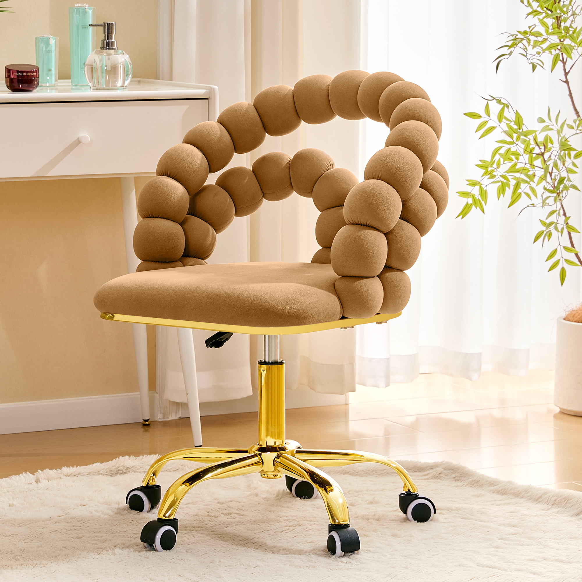 Silla giratoria de terciopelo con respaldo burbuja, altura ajustable, base dorada y ruedas
