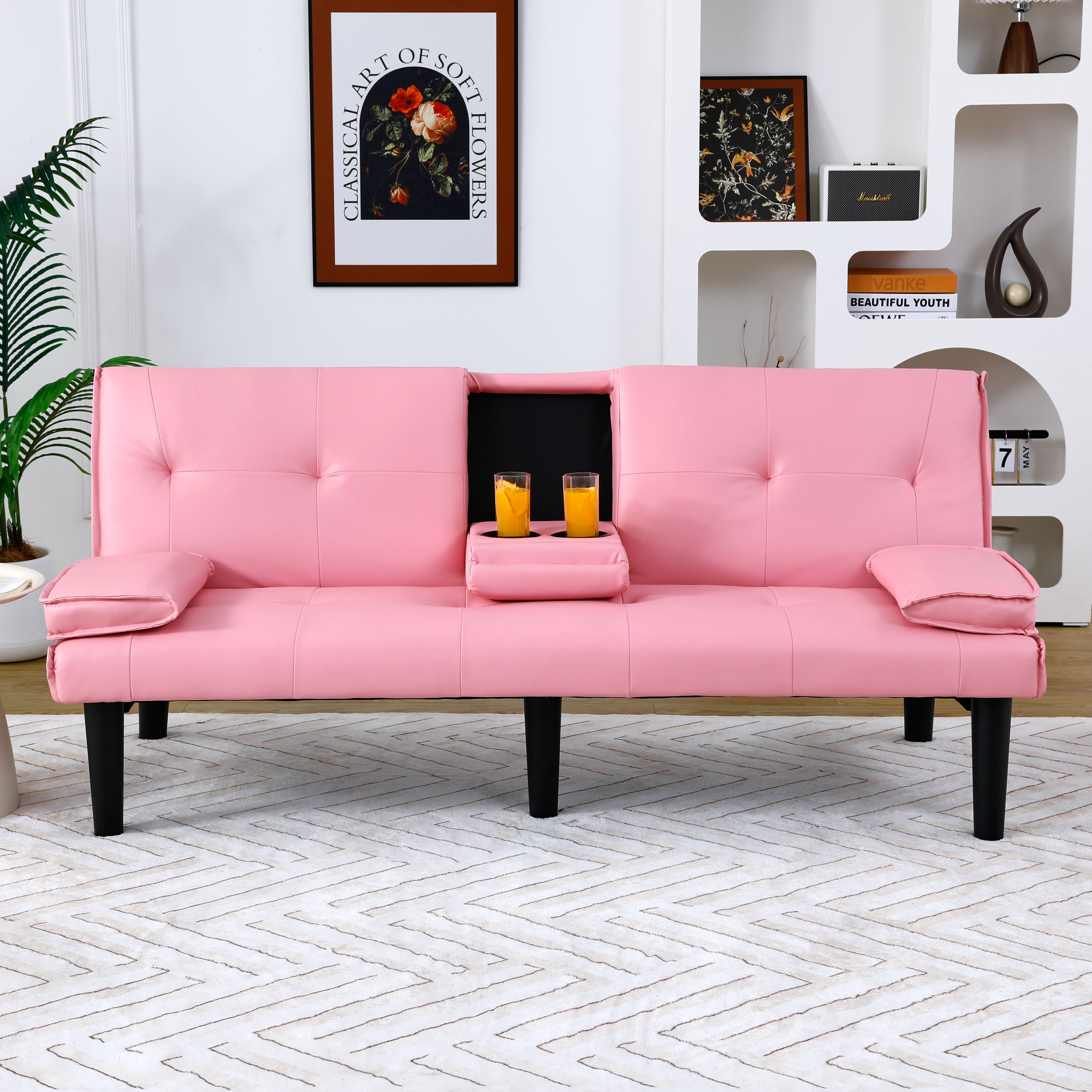 The 67-inch Pink PVC Multi-functional Sofa Bed, With A Foldable And Cup Holder Design, Makes It Extremely Convenient To Turn The Living Room Into A Guest Room
