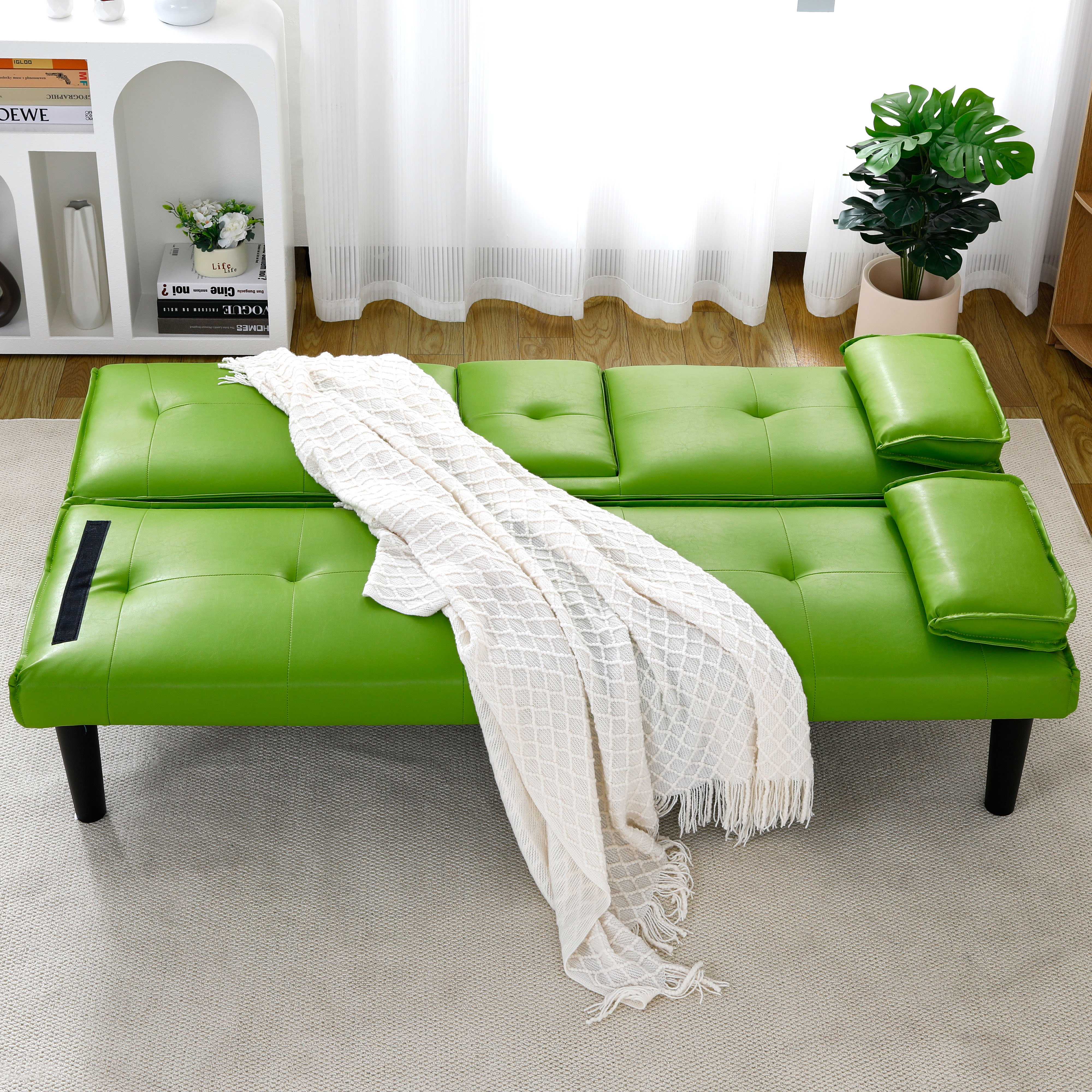 The 67-inch Green PVC Multi-functional Sofa Bed, With A Foldable And Cup Holder Design, Makes It Extremely Convenient To Turn The Living Room Into A Guest Room