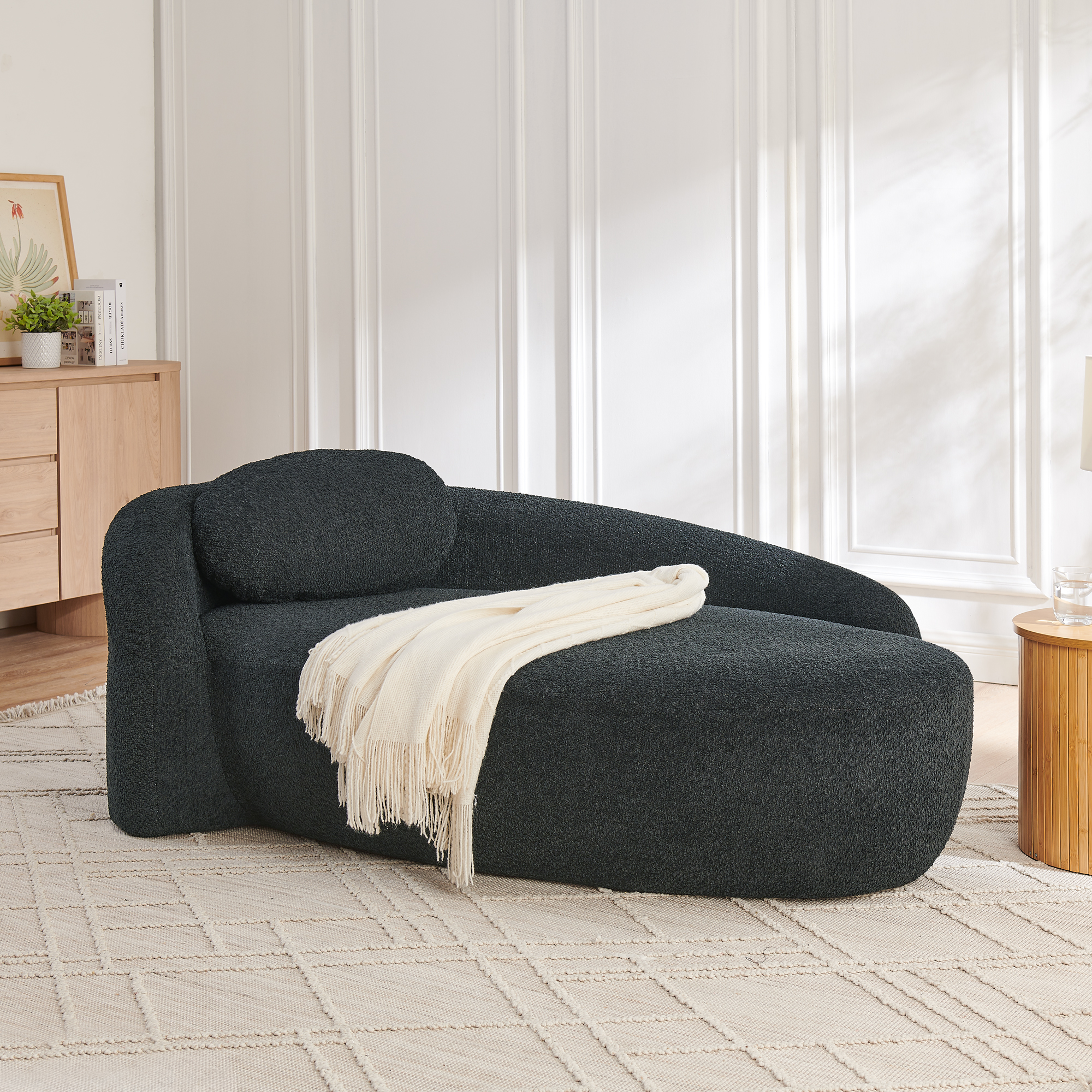 Sillón reclinable moderno ovalado individual con respaldo, reposabrazos y almohada negro