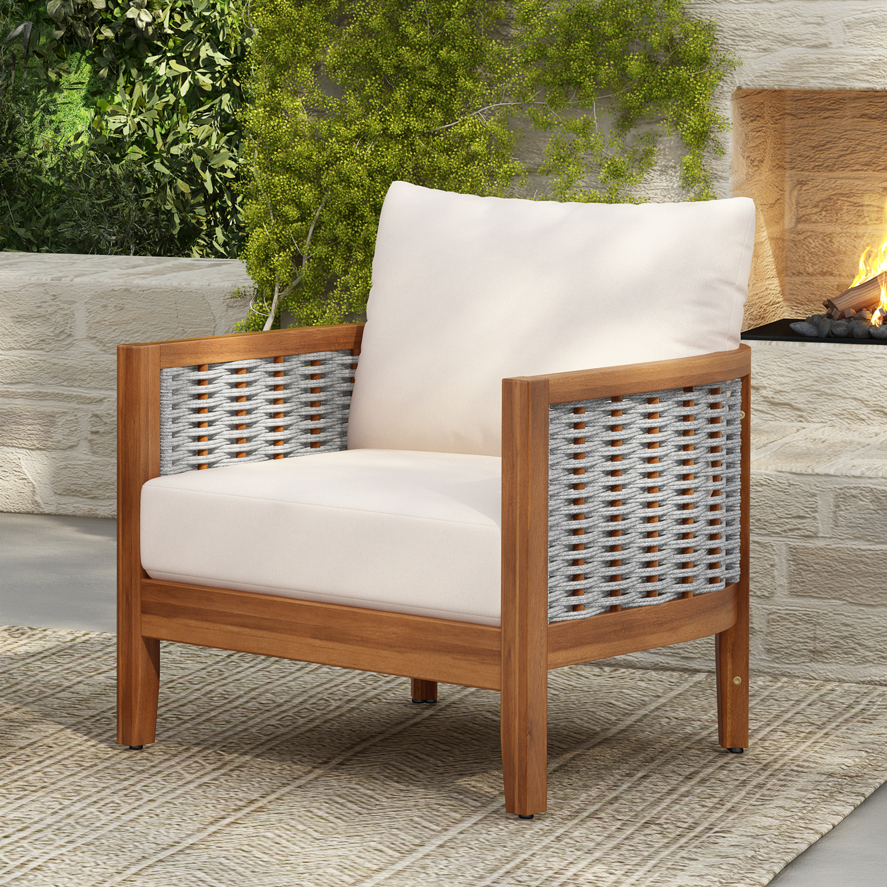 Sillón para exterior de madera de acacia con cuerda tejida y cojines suaves