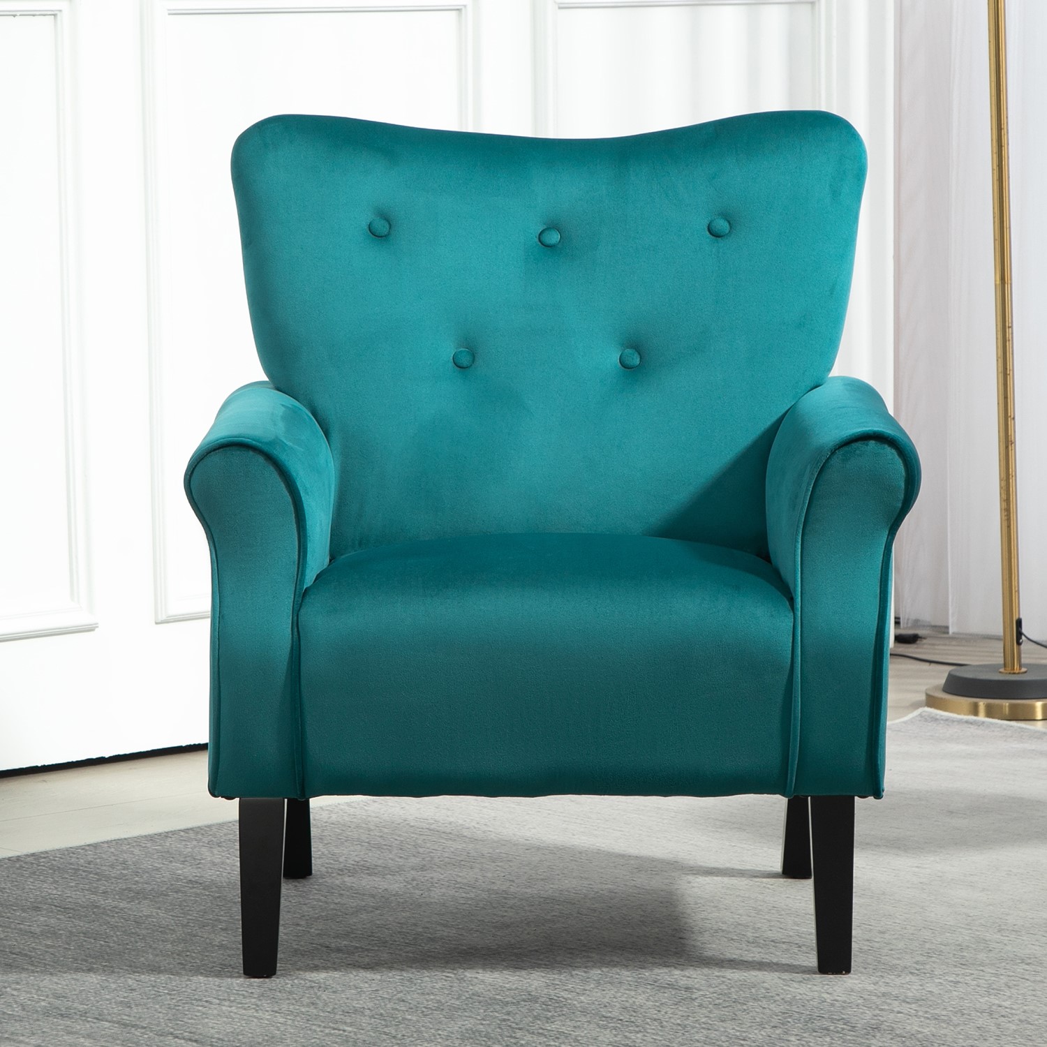 Sillón Mid-Century Modern, tapizado en tela, patas de madera, respaldo alto.
